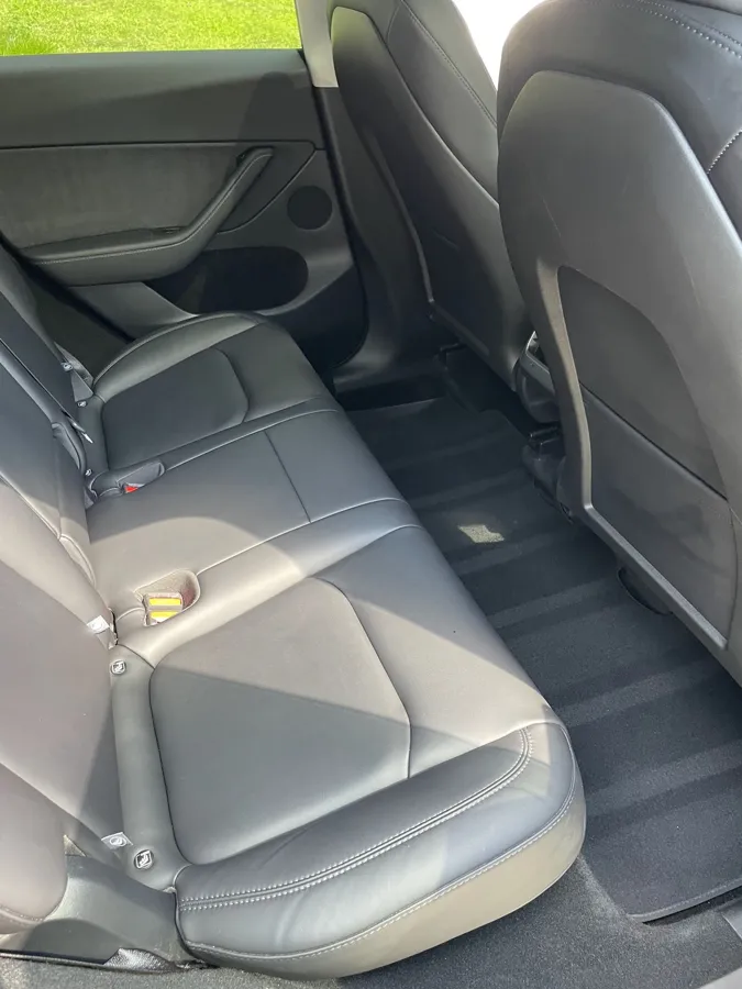 Clean leather back seat after a mobile interior detail in Lincoln, NE