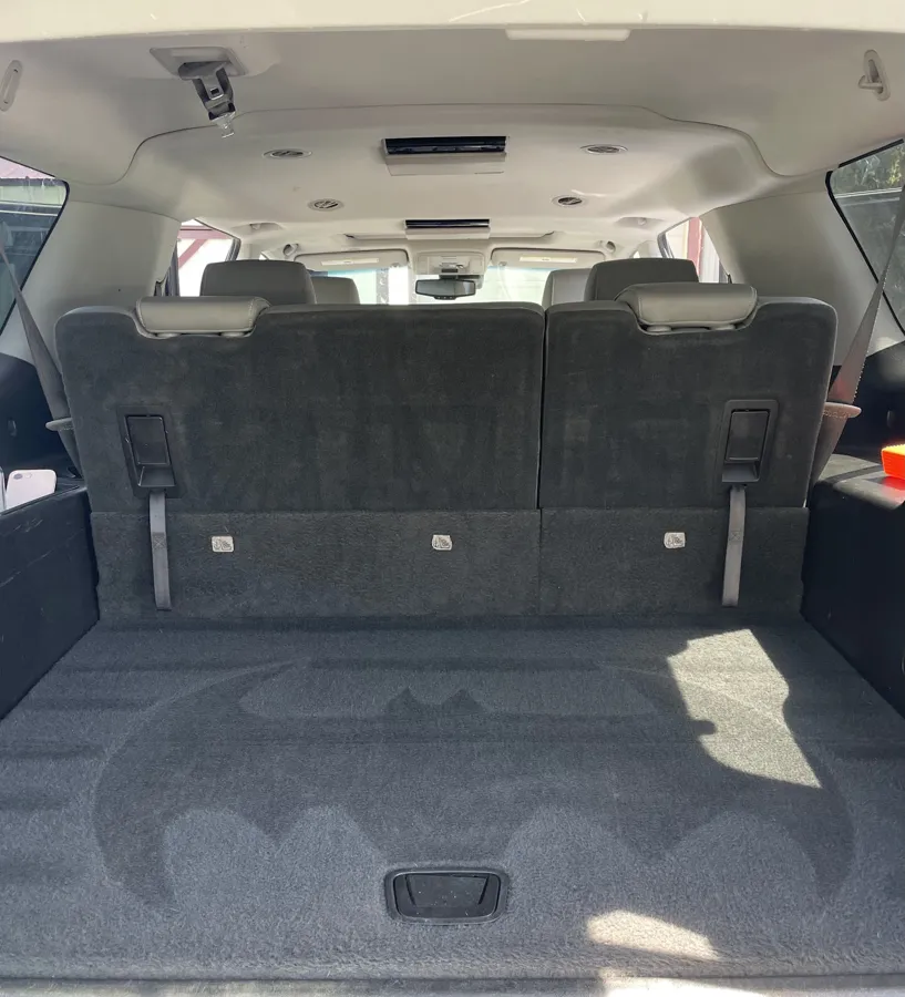 Vacuum lines across an SUV cargo area after an interior detail in Lincoln