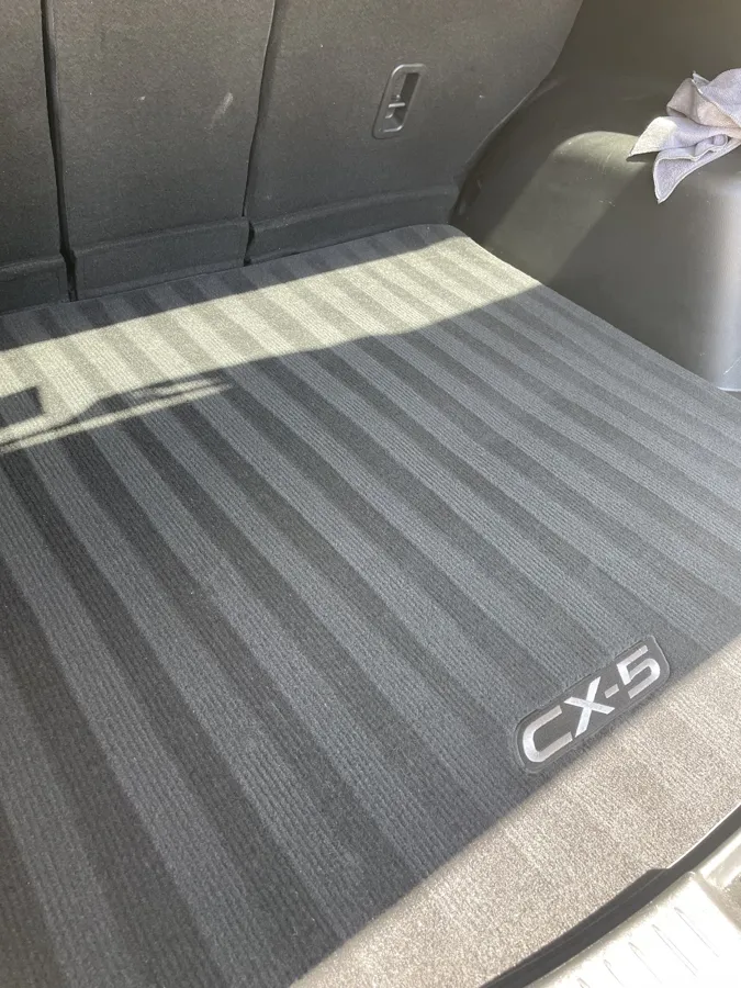 Freshly vacuumed Mazda CX-5 cargo mat after a mobile detail
